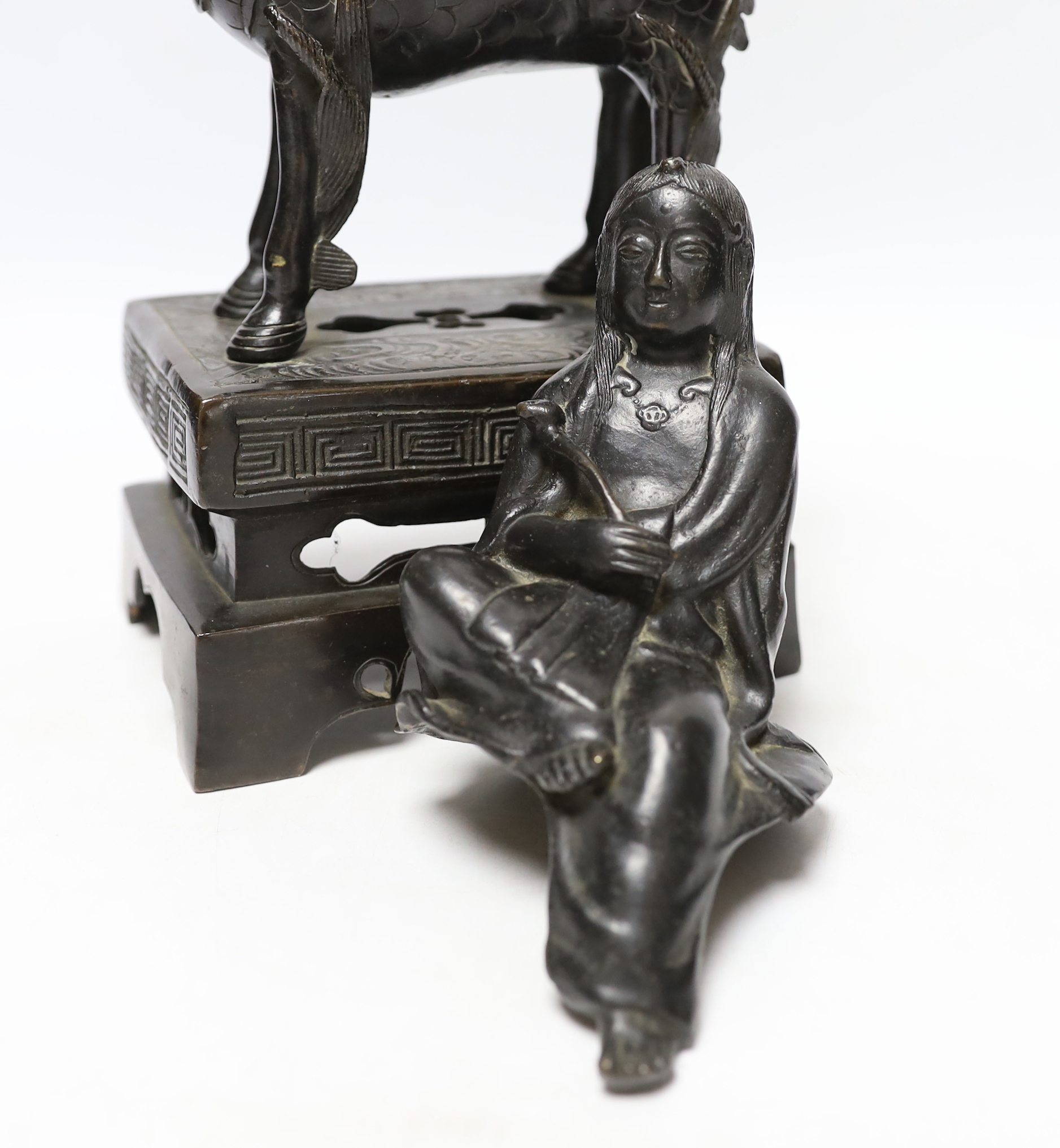 An 18th century Chinese bronze figure of a qilin together with a Japanese figural bronze mount, tallest 25cm